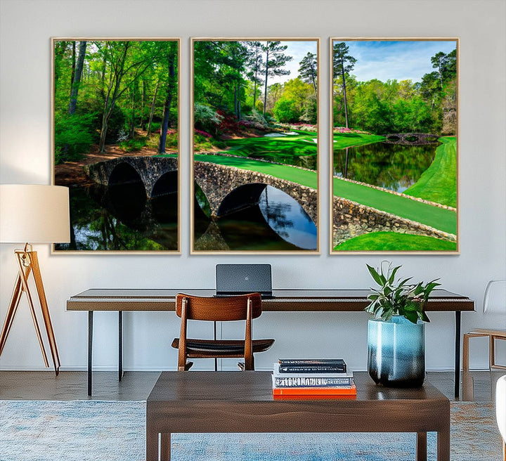 The wall art from Augusta National Golf Club showcases a panoramic bridge set against rich, lush greenery on a framed triptych canvas.