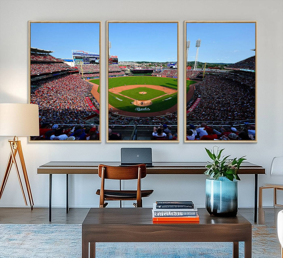 The Cincinnati Reds Baseball Team print of Great American Ball Park Stadium adorns the wall.