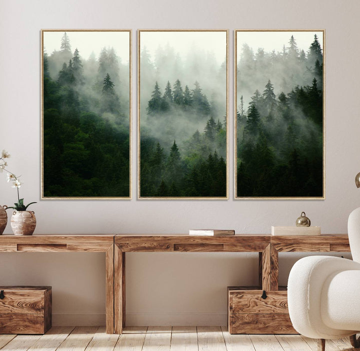 The Misty Forest Wall Art Canvas Print captures a serene, foggy evergreen landscape, evoking a mysterious woodland ambiance.