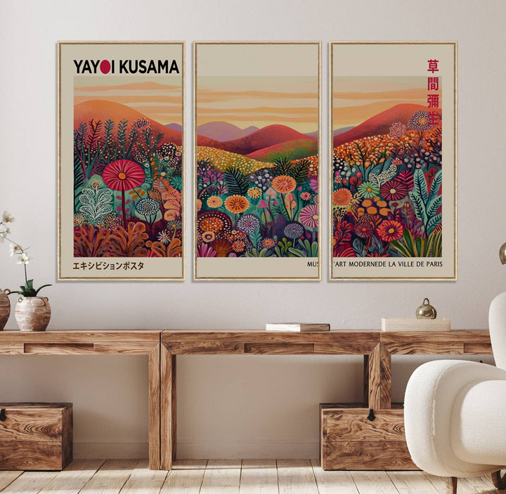 A framed Yayoi Kusama abstract landscape art print adorns the wall.