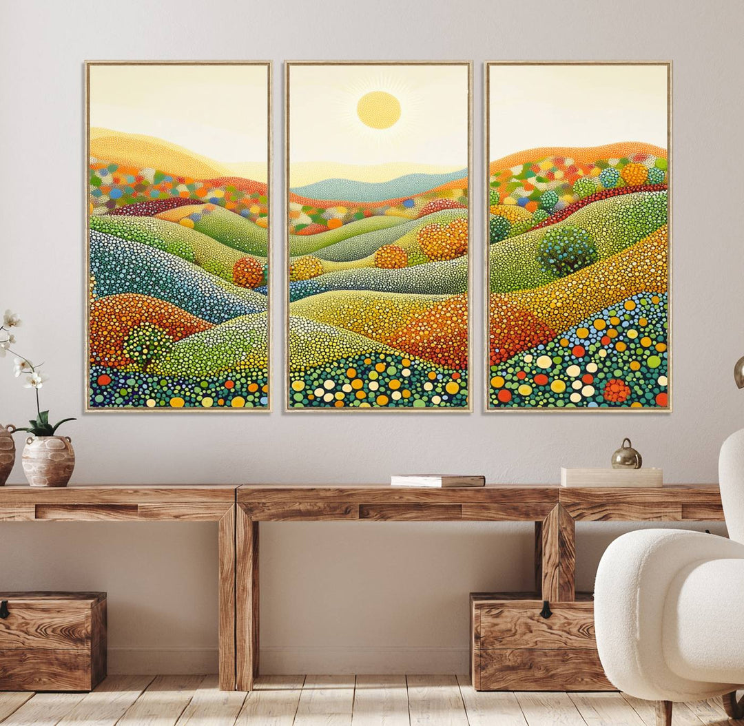 The YAYOI KUSAMA Colorful Dot Art Landscape Canvas depicts vibrant rolling hills and a sun.