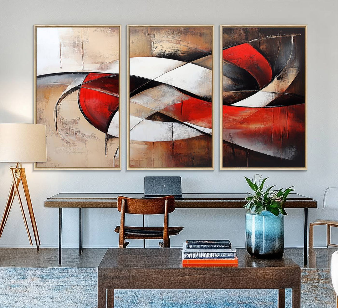 The "Abstract Wall Art - Modern Red and White Canvas Wall Art Print" features bold geometric shapes in red, black, and white on a beige background, enhancing contemporary aesthetics. This canvas print adds a striking focal point to any room, beautifully complementing the modern vibe of the space.