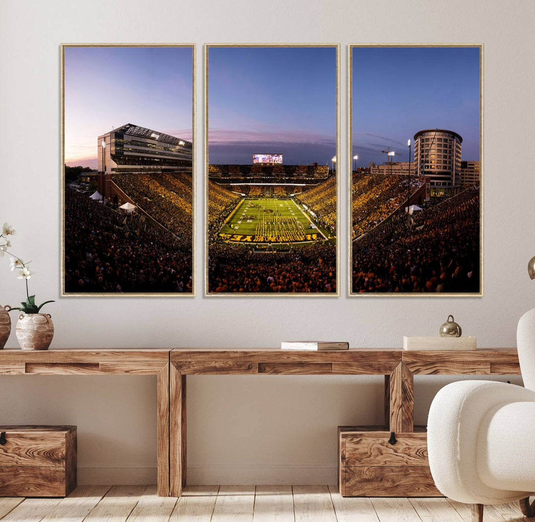 The Iowa Hawkeyes Kinnick Stadium Wall Art Canvas Print captures a sunset scene, making it perfect for display on a wall.