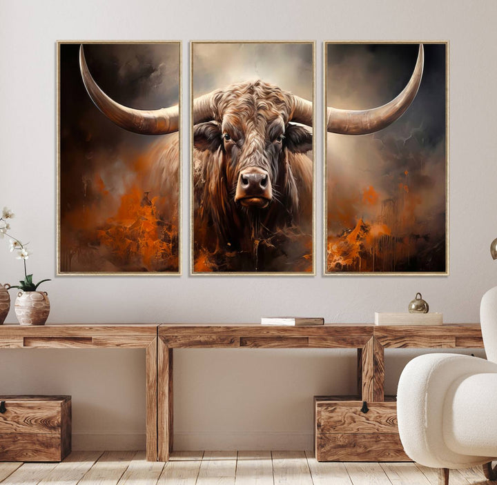 A Highland Bull with striking horns is depicted in a fiery abstract style on a ready-to-hang wall art canvas, evoking strength.