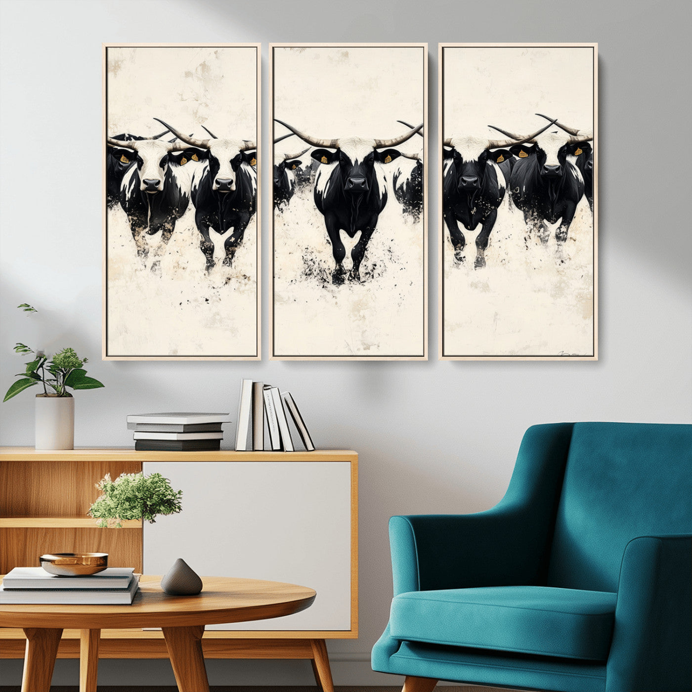 Canvas artwork of black and white Texas longhorns in a bold stampede over a minimalist background, ideal for rustic modern or Western-themed decor.