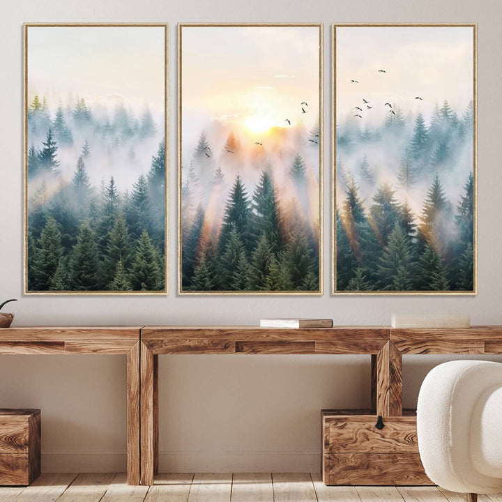 Misty Pine Forest Wall Art: A depiction of sunrise over foggy trees and birds against a bright sky; a framed woodland scene ideal for home or office decor.