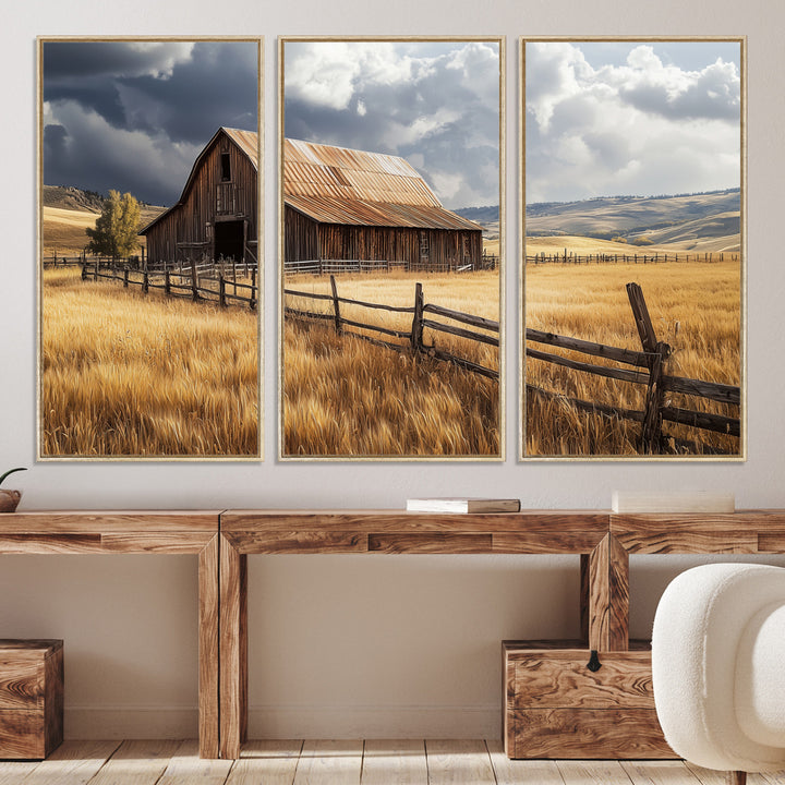 Canvas of a weathered wooden barn in a golden field under a dramatic sky, perfect for rustic or farmhouse-style wall decor.