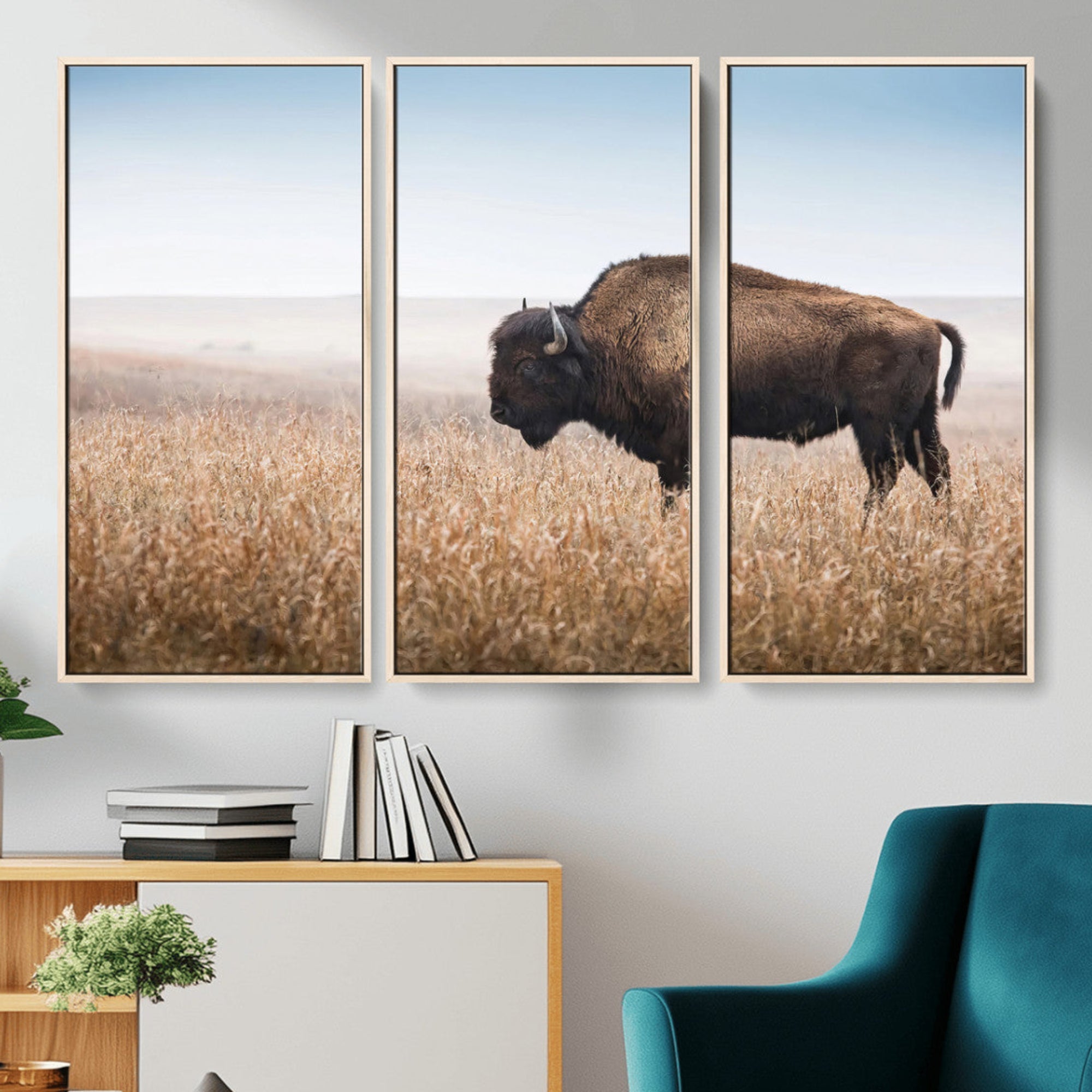 A solitary American bison stands in a dry grassland under soft skies, ideal for rustic or western-style home decor in warm neutral tones.