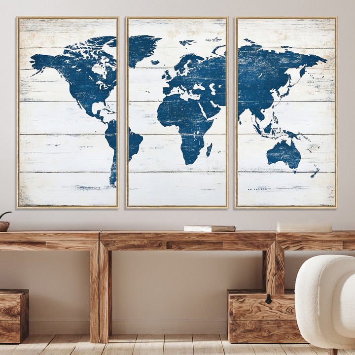 Rustic world map with blue continents on distressed wooden planks, perfect for coastal, explorer, or vintage-style wall decor.