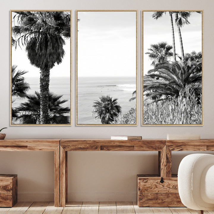 Monochrome canvas of palm trees framing a coastal surf scene, perfect for California-inspired or retro black-and-white beach decor.