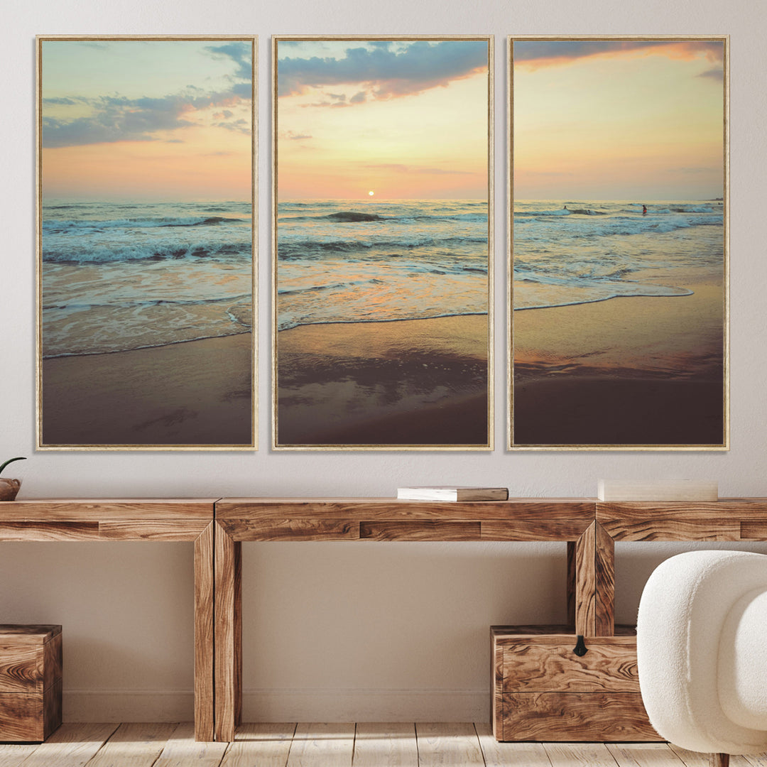 Warm sunset over gentle ocean waves with pastel sky and reflections on wet sand, creating a calm and soothing beach ambiance.