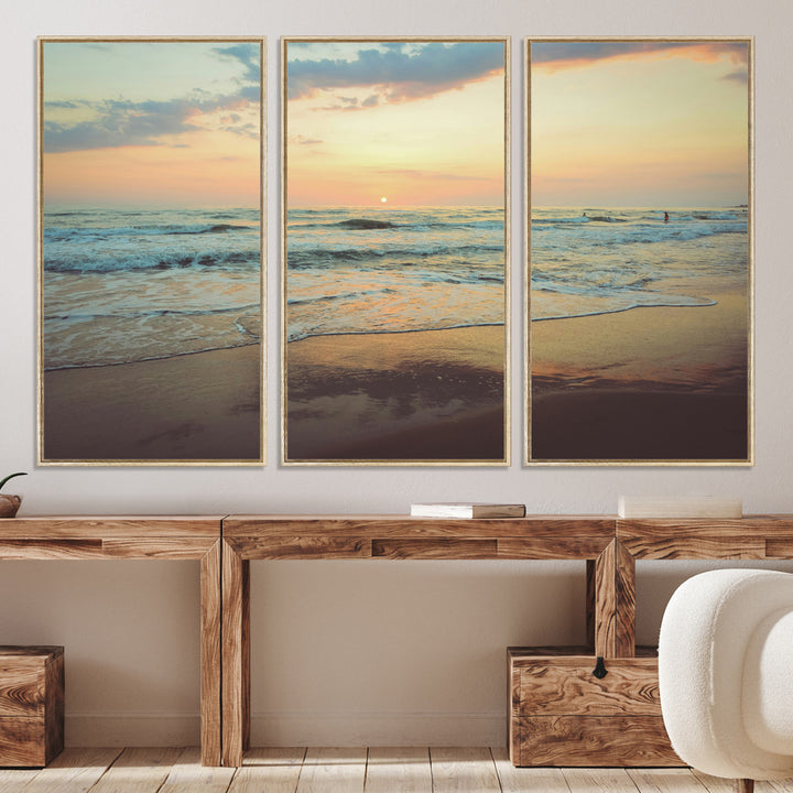 Warm sunset over gentle ocean waves with pastel sky and reflections on wet sand, creating a calm and soothing beach ambiance.