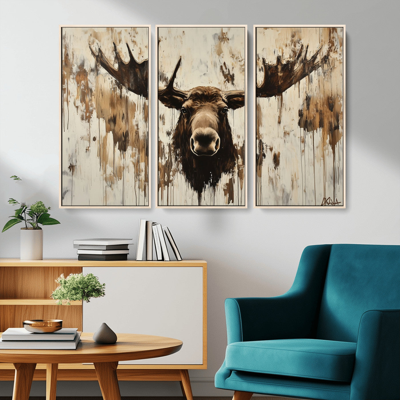 Expressive painting of a moose head with wide antlers in dark brown and beige tones, featuring paint drips and splatters on a light textured background, creating a striking rustic wall art canvas.