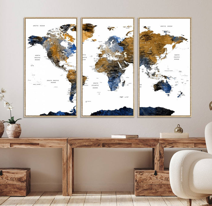 The Triptych Modern World Map Canvas in blue and brown is an ideal global decor piece for enhancing living rooms or offices. It comes ready to hang.