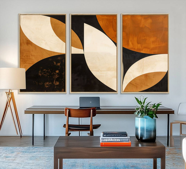 Geometric abstract wall art print featuring leaf shapes in brown, beige, and black.