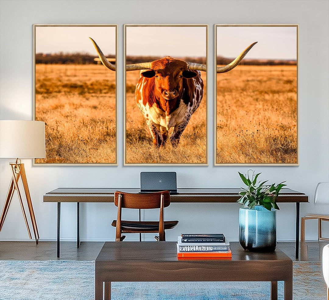 The Longhorn Cow Wall Art framed canvas brings rustic charm and farmhouse decor with its warm field scene.