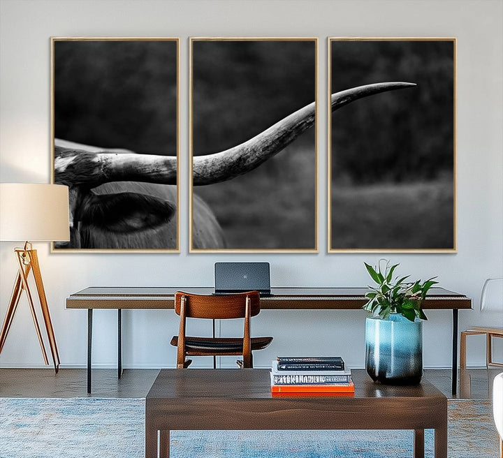 Cow Longhorn Wall Art: This black and white print adds rustic charm.