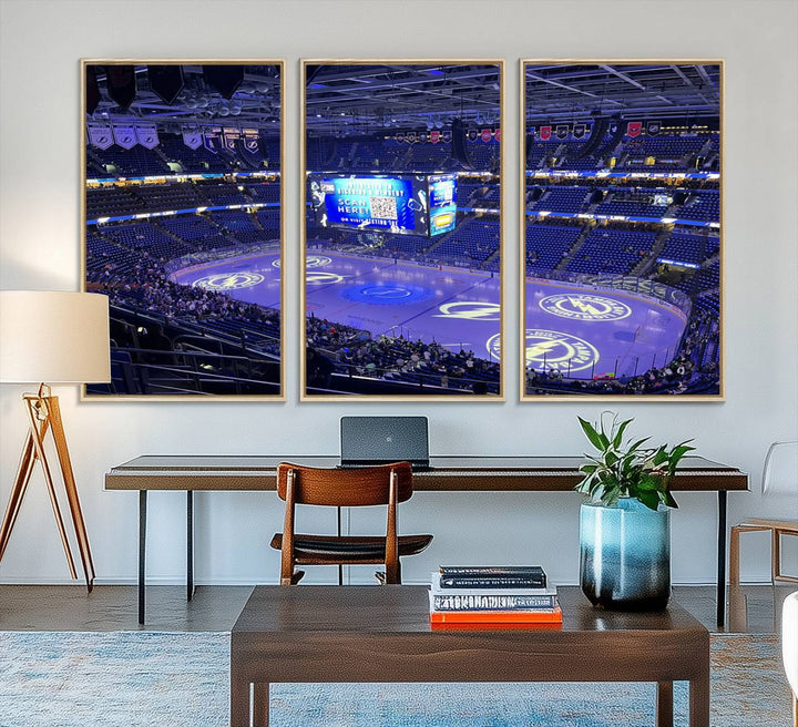 The wall art canvas print at Amalie Arena features team logos on ice, encapsulating the vibrant atmosphere of an NHL hockey stadium.