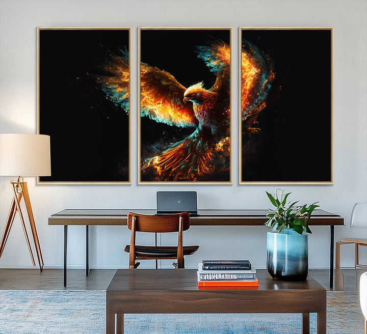 The Fiery Phoenix Canvas Print, showcasing a majestic bird with fiery wings against a black background, makes for the perfect bold decor in your living room.