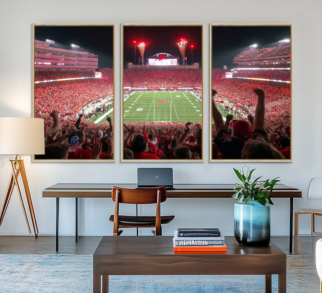 A vibrant canvas print of the Lincoln Memorial Stadium at night with fireworks, featuring the University of Nebraska Cornhuskers Football.