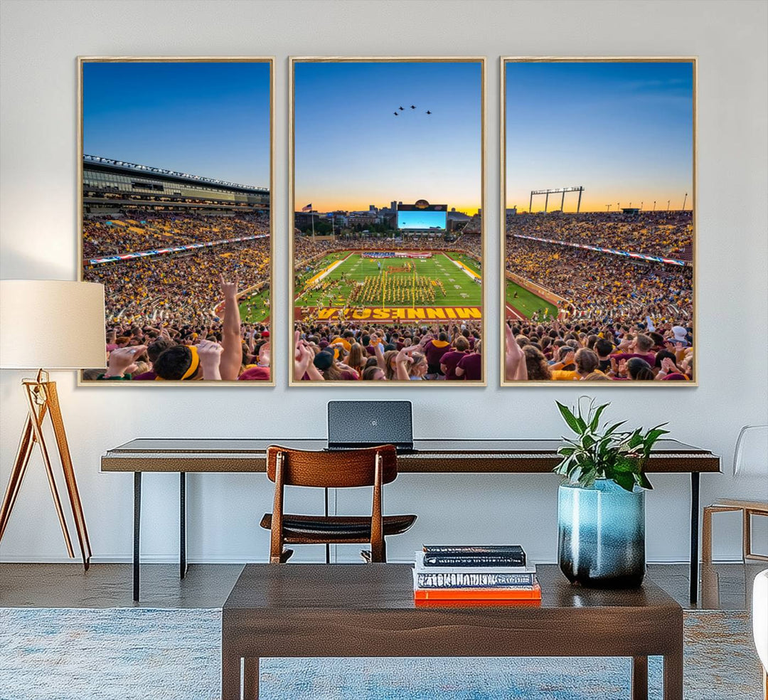 Canvas wall art featuring the University of Minnesota Football Team print, showcasing Huntington Bank Stadium at sunset with jets overhead.