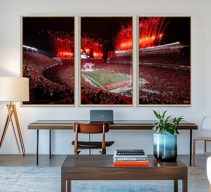 A vibrant red canvas art of a packed Ohio State Buckeyes stadium at night with fireworks.