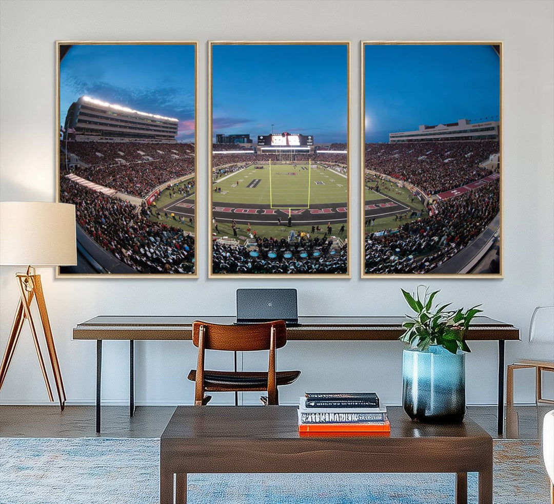 The wall art in the living room features a Texas Tech Red Raiders Football Team Print, showcasing Jones AT&T Stadium at dusk.