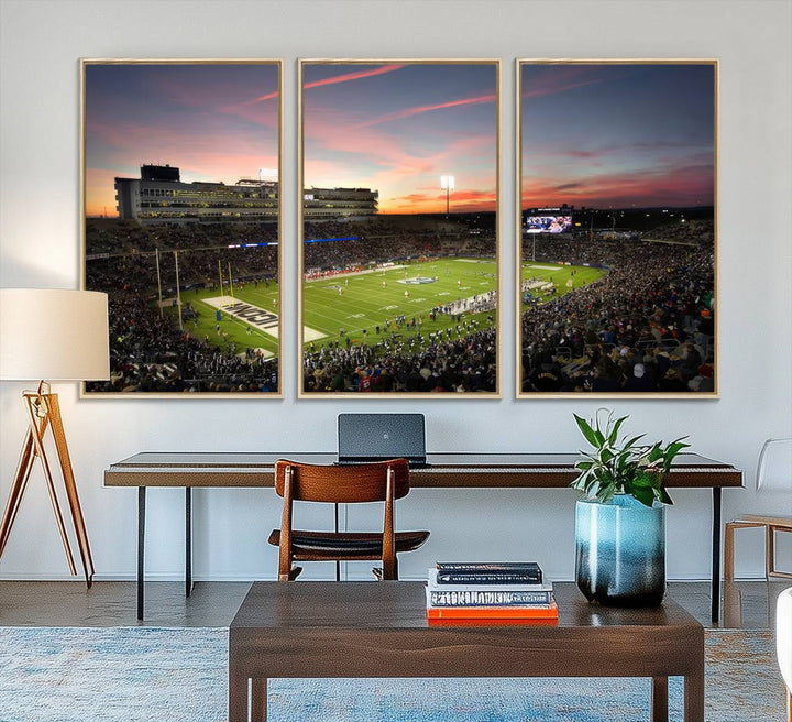 This wall art canvas print captures UCONN Huskies fans energizing a sunset scene at East Hartfords Pratt & Whitney Stadium.