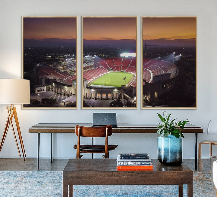 The USC Trojans Stadium canvas captures Memorial Coliseum at twilight, showcasing red seats and a green field beneath an orange sky.