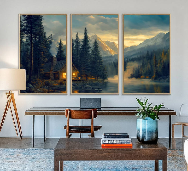 Serene sunset lake wall art: a cozy mountain cabin with lights, framed by pine trees and set against a moody sky. Ideal for adding rustic lodge charm to your space.