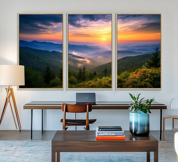 The Majestic Mountain Sunrise Print features a vibrant sky, layered hills, and evergreens, making it a stunning piece of wall decor.