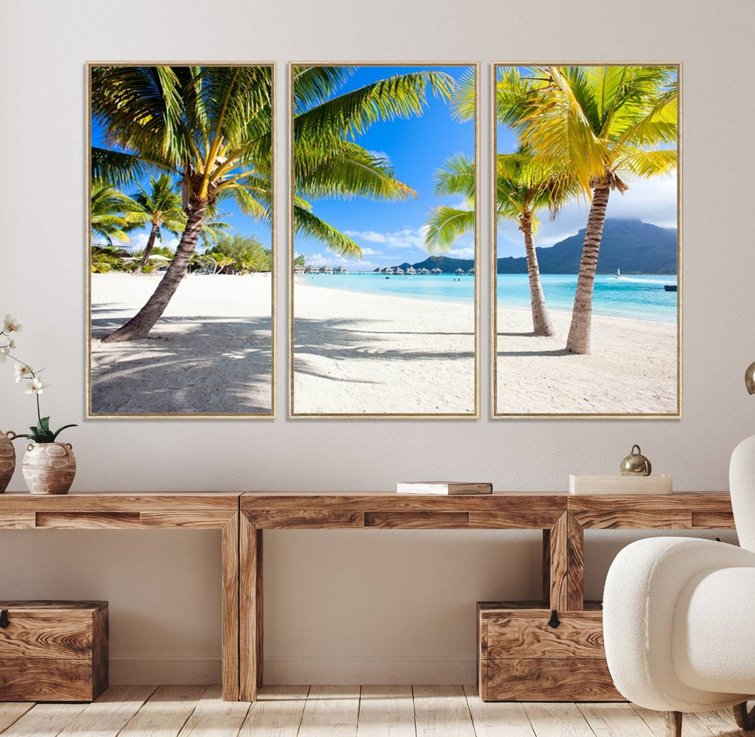 Blue Beach and Sea Wall Art Canvas Print: showcases a tropical scene with palm trees, white sand, and turquoise water.