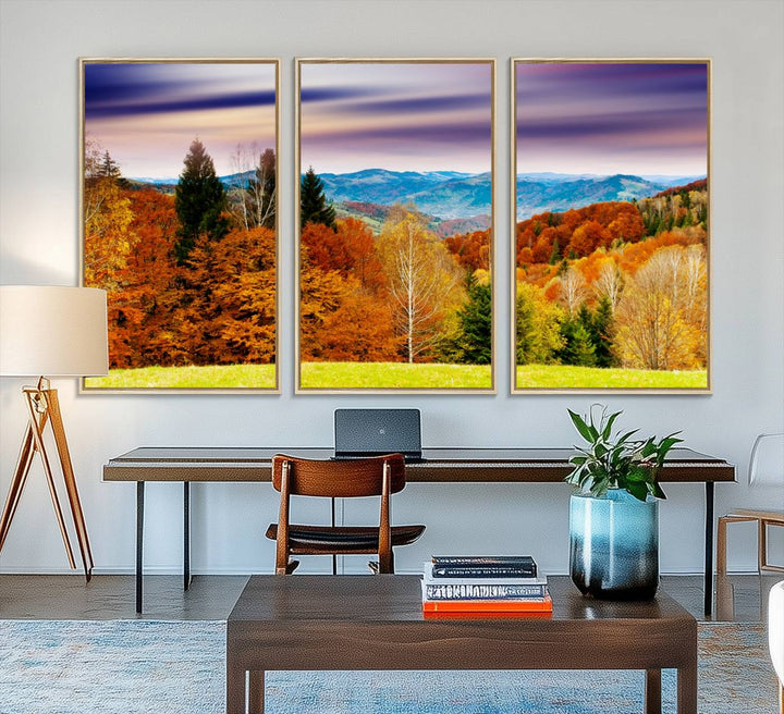 The wall art in the kitchen dining area is a large Autumn Forest Mountain Canvas Print that captures a vivid scenic landscape.