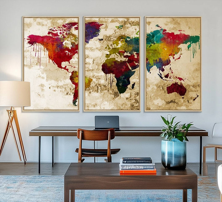 The Rainbow Colored Vintage World Map Canvas Print decorates the room.