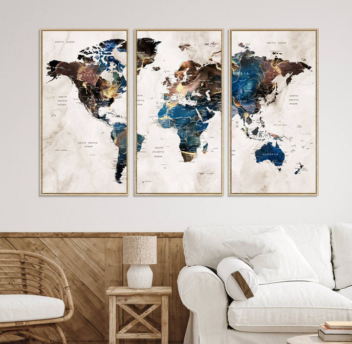 Abstract earth-toned 3-panel world map wall art featuring blues and browns, ready to hang; it showcases continents on modern canvas.