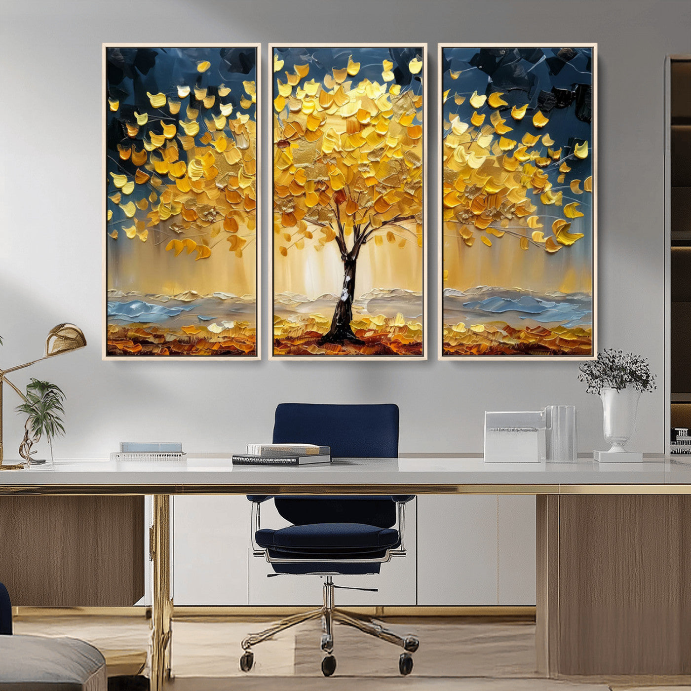 Canvas of a golden autumn tree with textured brushstrokes and moody blue skies, perfect for dramatic and vibrant home decor.