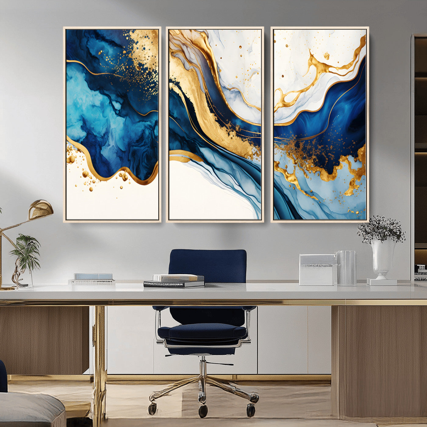 Canvas artwork with fluid blue and gold marbling, perfect for modern luxe or elegant abstract home decor styles.