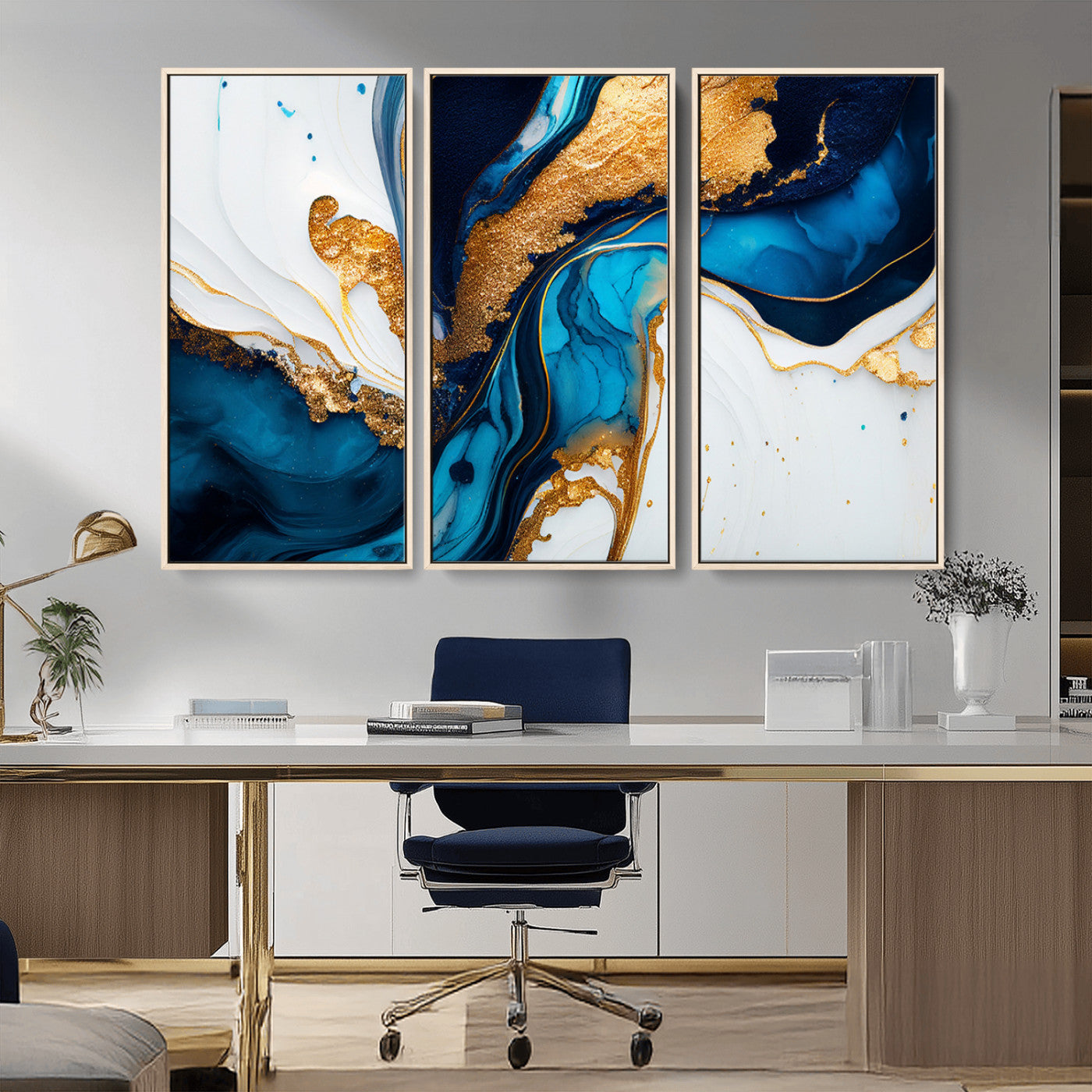 Luxurious abstract canvas in gold, navy, and teal tones with fluid marble patterns, perfect for modern glam or upscale interiors.