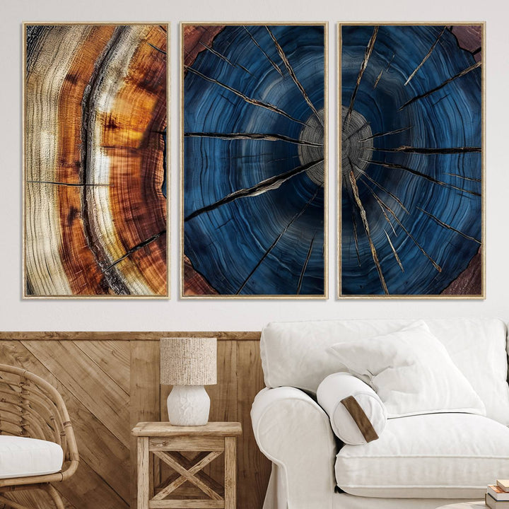 The Abstract Tree Rings Canvas Print features blue, brown, and orange rings that highlight wood grain and natures beauty.