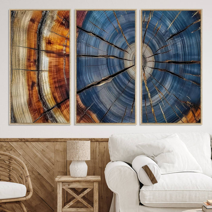 Close-up of blue, brown, and orange wood grain rings on the Abstract Tree Rings Canvas Wall Art Print.