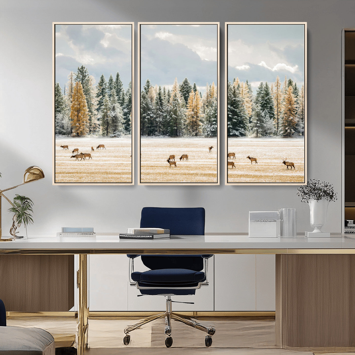 Elk herd in a snowy field with golden pine trees and frosted evergreens, ideal for neutral rustic or cabin-style home decor.