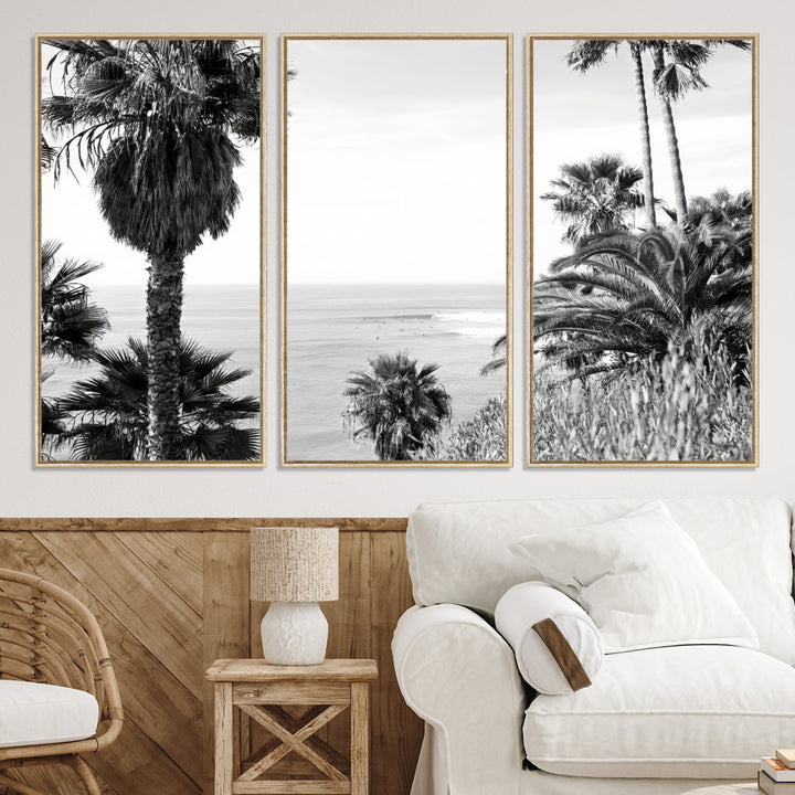 Monochrome canvas of palm trees framing a coastal surf scene, perfect for California-inspired or retro black-and-white beach decor.