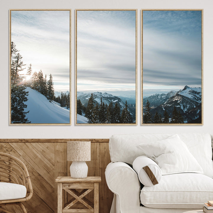 A breathtaking view of snow-covered mountains with evergreen trees and soft sunlight peeking through, creating a serene and peaceful winter scene.
