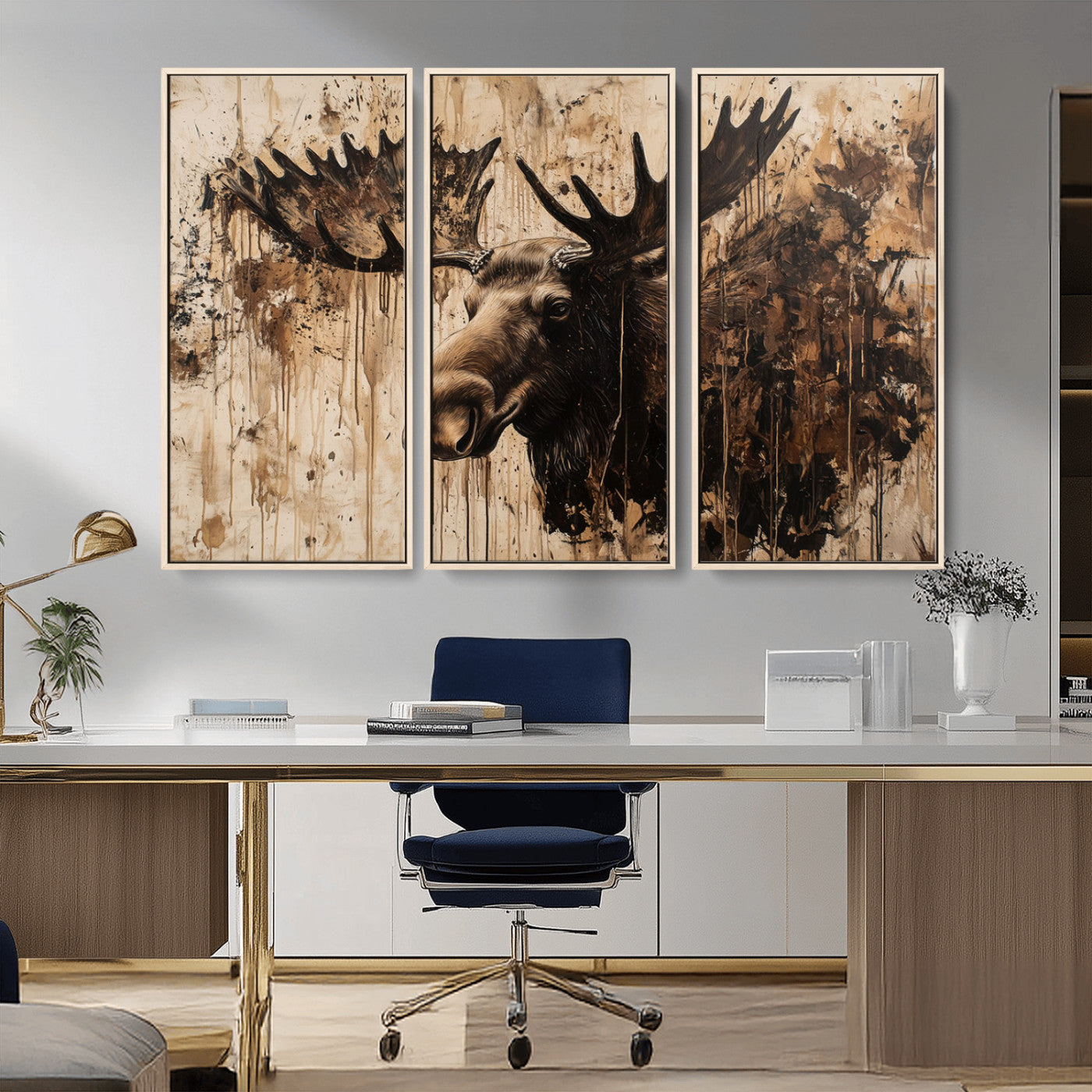Artistic painting of a moose head with large antlers in shades of brown and black, with paint splatters and drips on a beige textured background, creating a rustic and expressive wall art canvas.