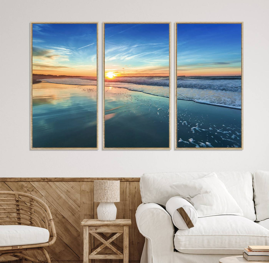 The Blue Sky and Beach Wall Art Canvas Print features a vibrant orange sky reflecting on wet sand.