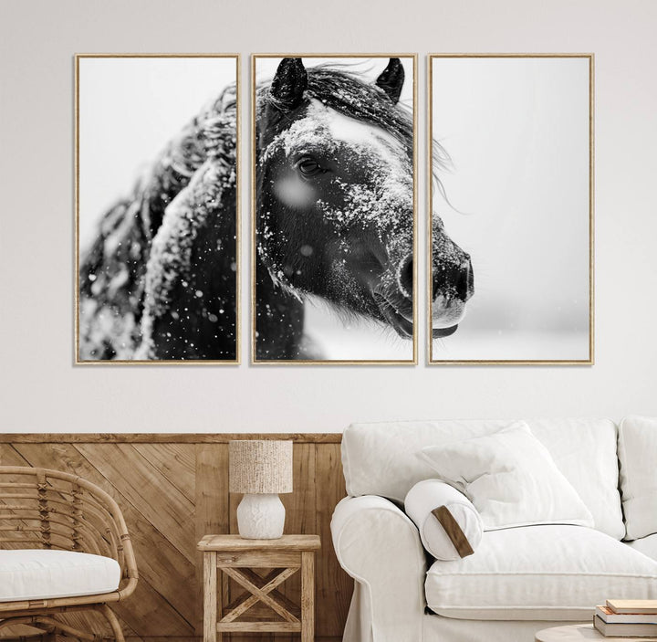 A large 3-panel rustic farmhouse wall art showcases a black and white winter horse canvas print against a snowy backdrop.