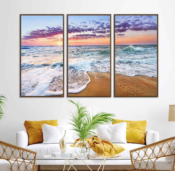 The Coastal Sunset Art Canvas Print features ocean waves beneath a vibrant sky in a stunning 3-panel seascape.