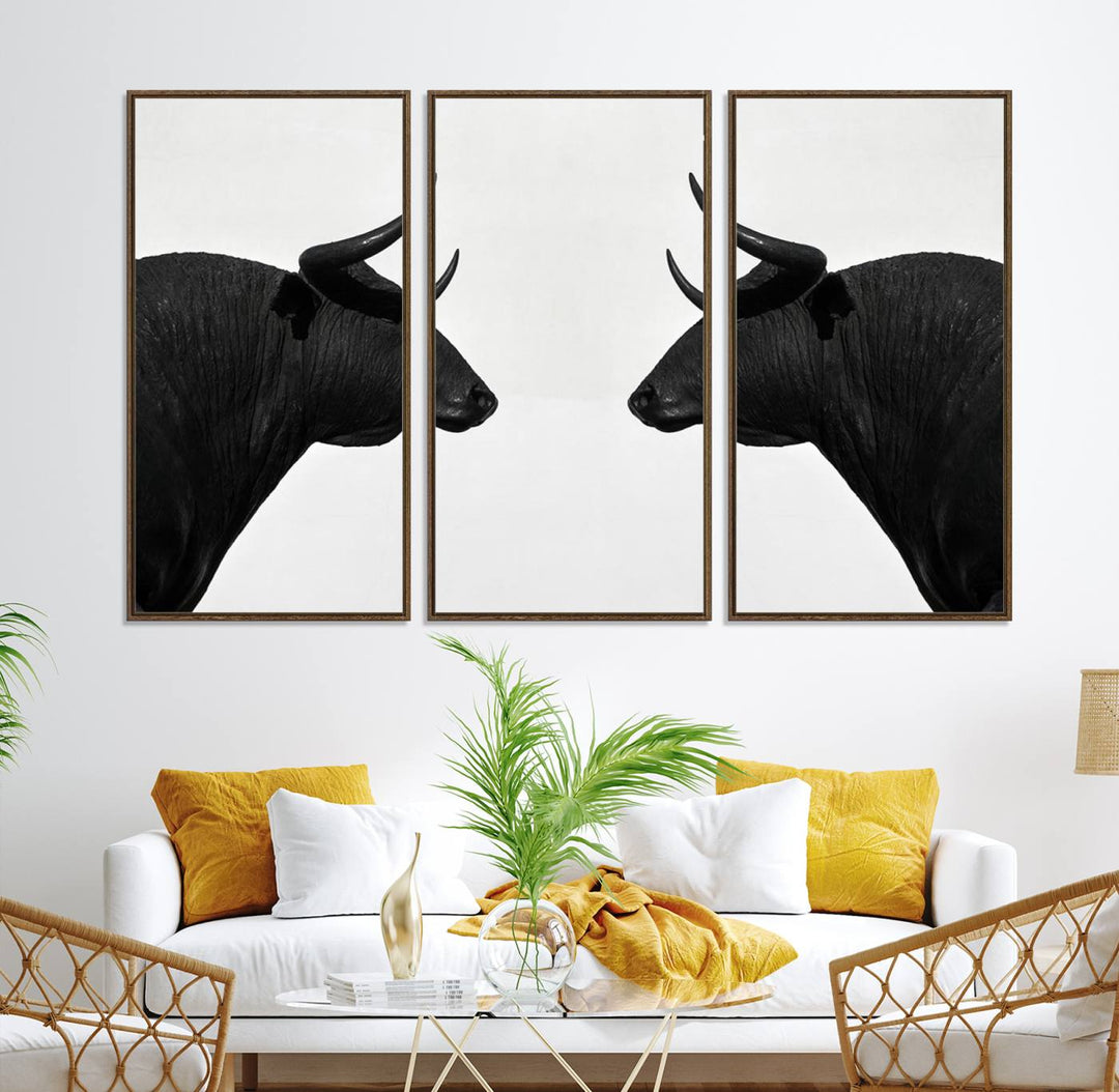 Spanish Bull Wall Art Canvas Print: Two black bull heads facing off on museum-quality canvas.