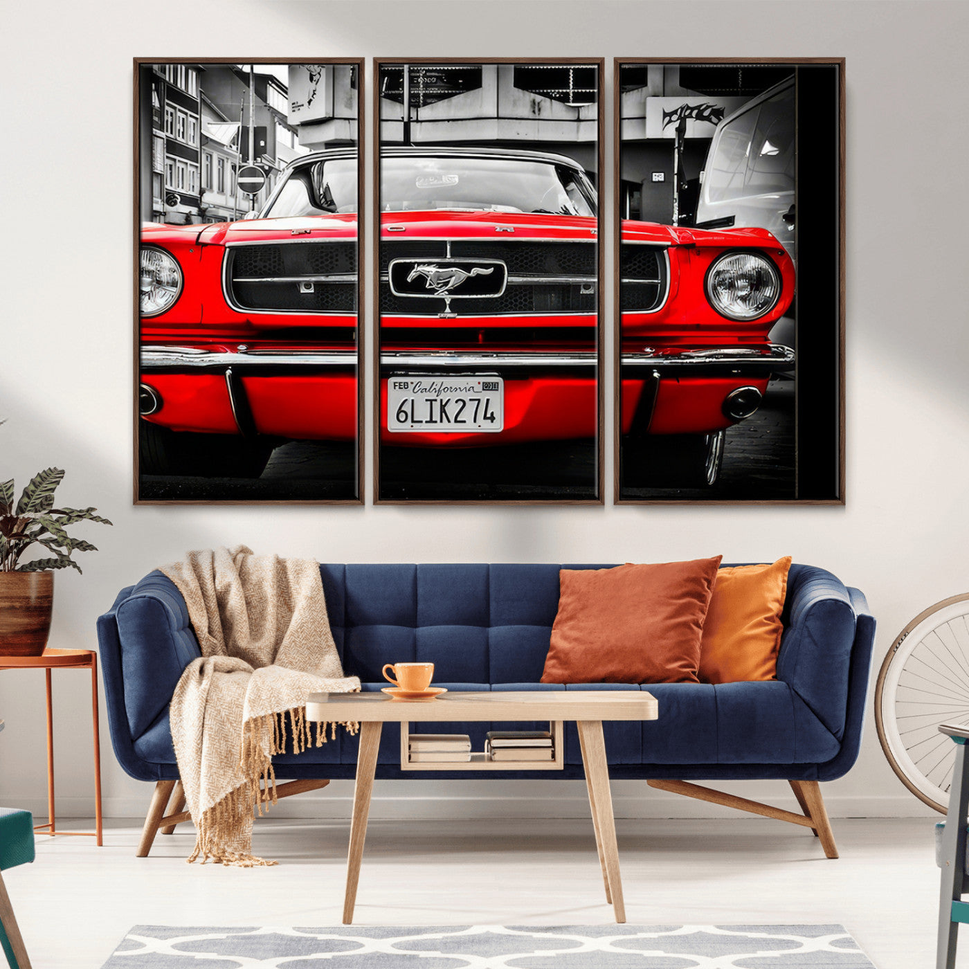Front view of a bold red 1960s Ford Mustang parked in an urban environment, captured in dramatic contrast with a black-and-white city backdrop, emphasizing its timeless American muscle car identity.