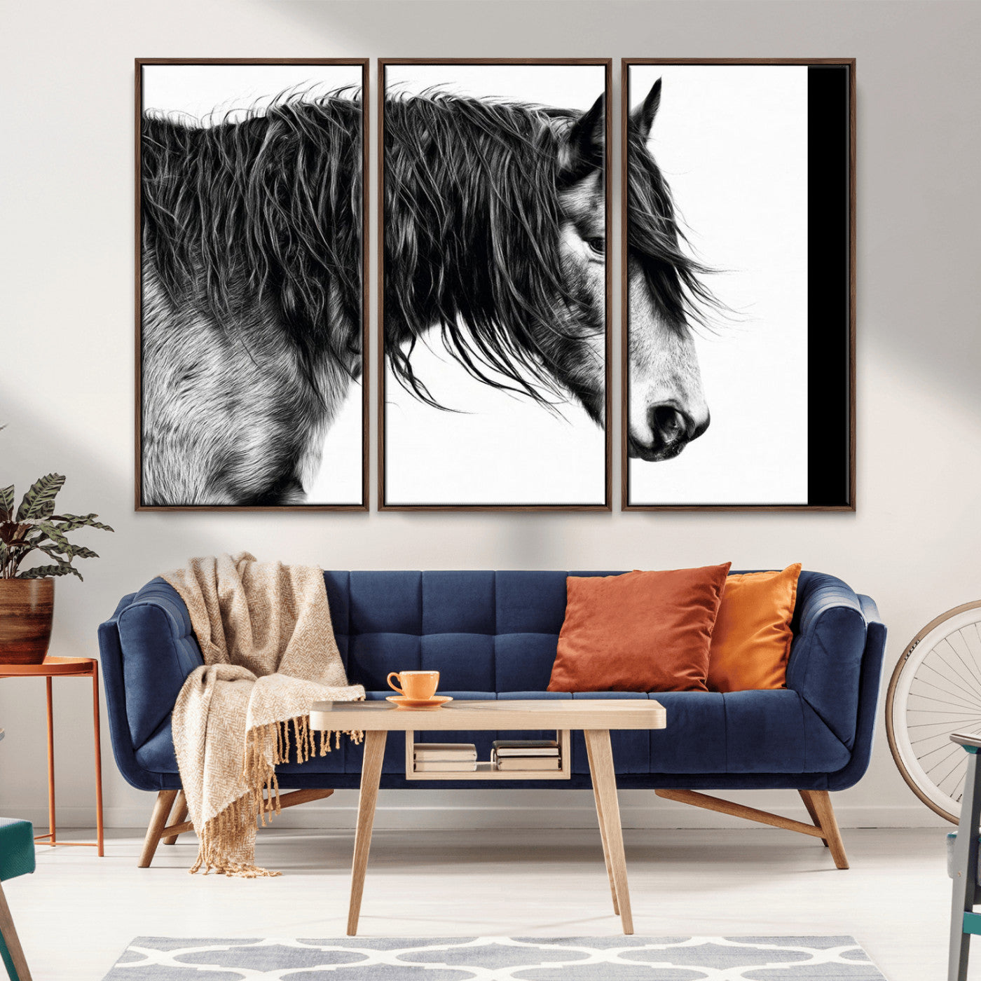 A stunning black-and-white portrait of a horse with a flowing mane, captured in dramatic detail and emotion.